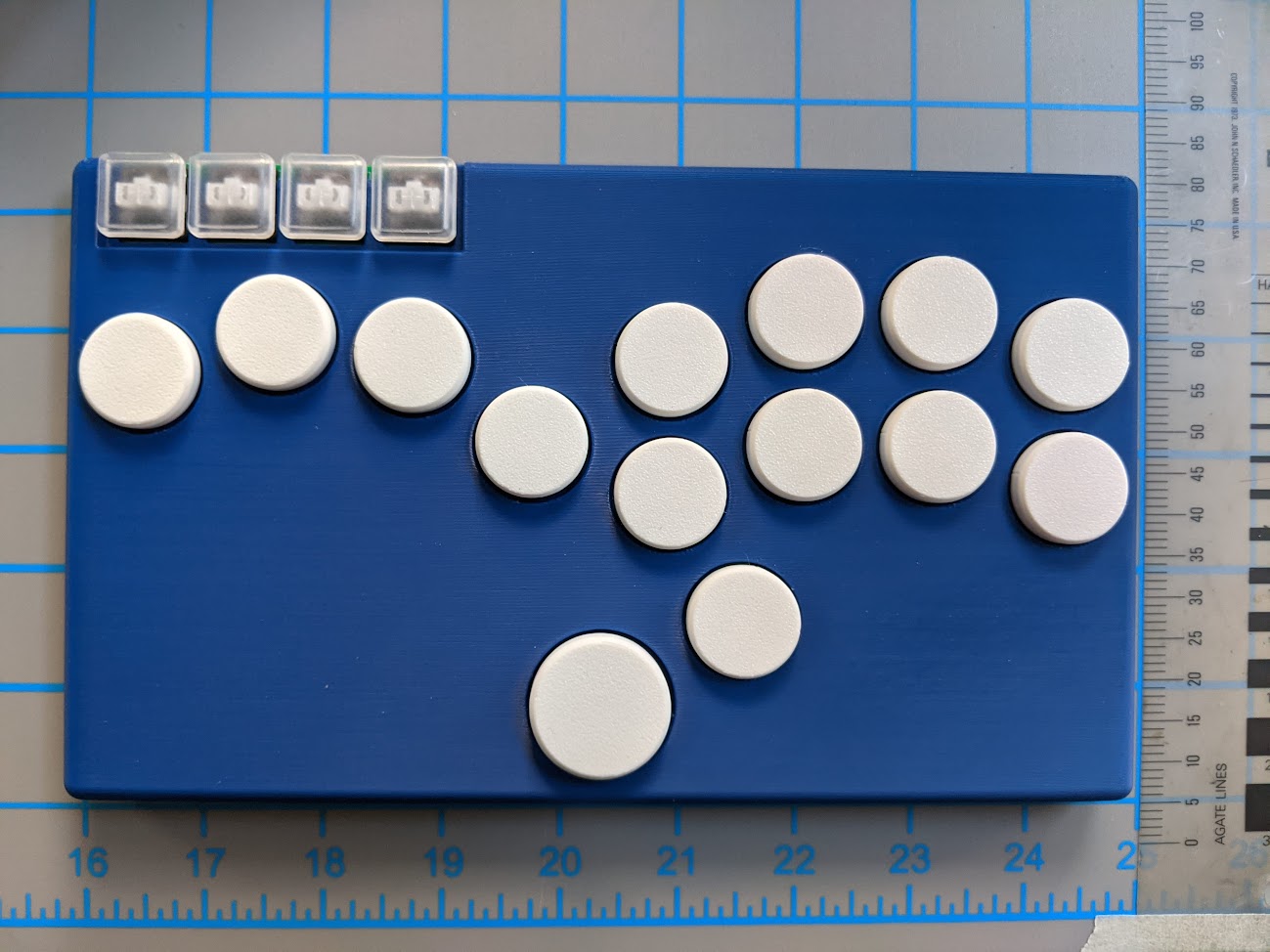 Blue case, white buttons, transparent menu buttons